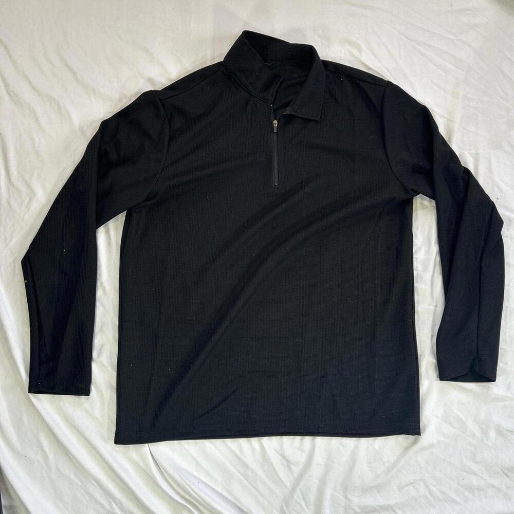 Black quarter zip pullover long sleeve top.